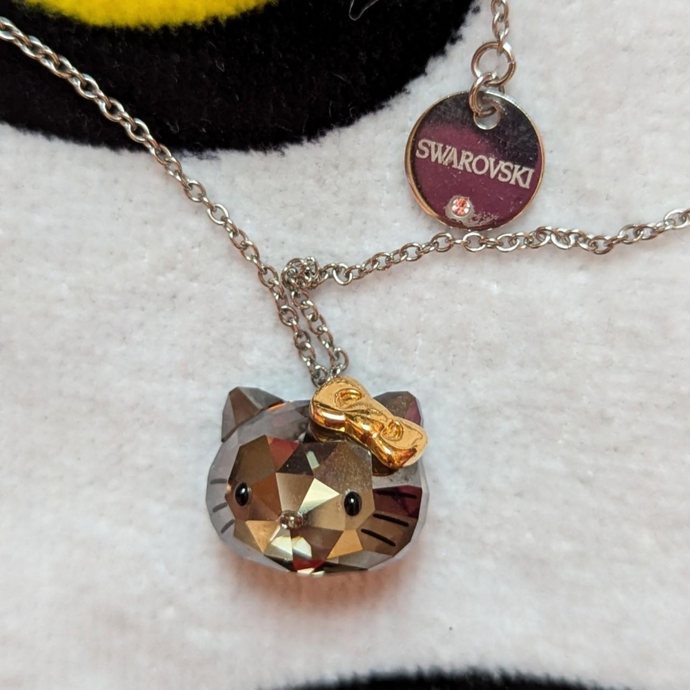 hello kitty x Swarovski necklace clear kitty head with gold bow
